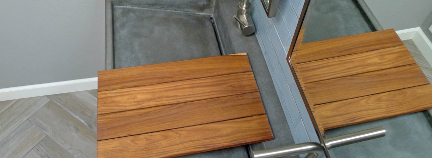 Concrete ramp sink with teak shelf