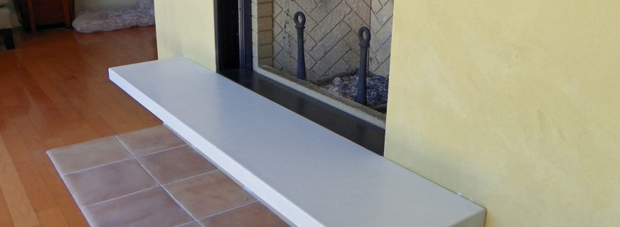 White concrete fireplace hearth