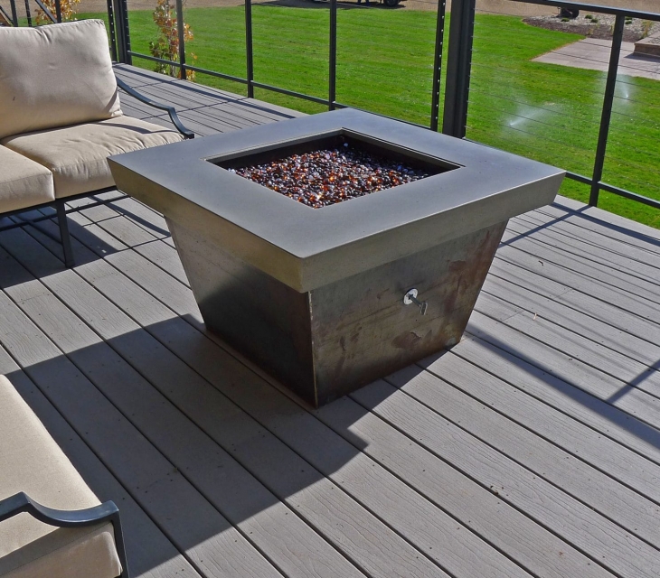 concrete and Corten steel fire pit