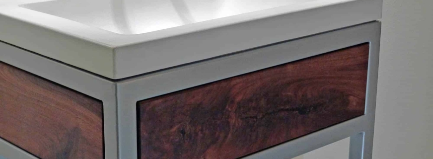 Concrete, steel,  and walnut vanity detail