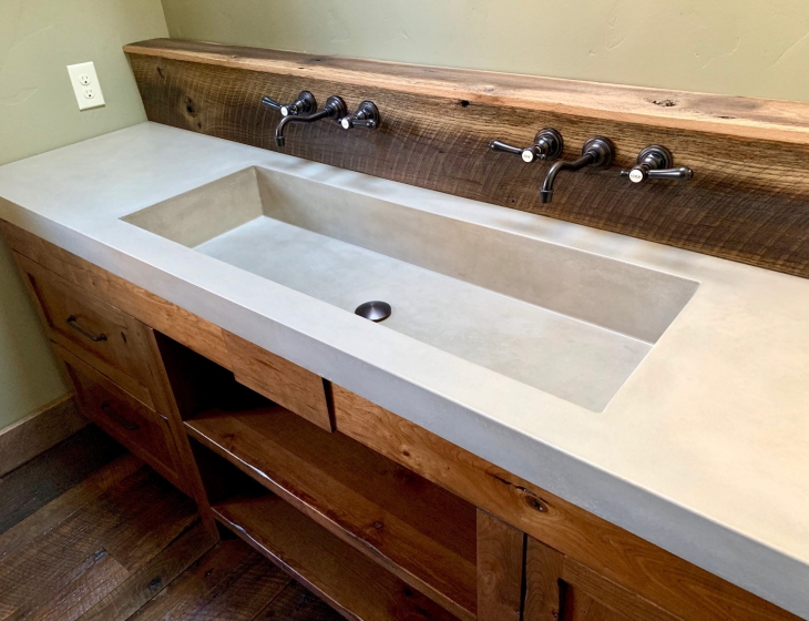 Boulder rustic master bathroom concrete sink