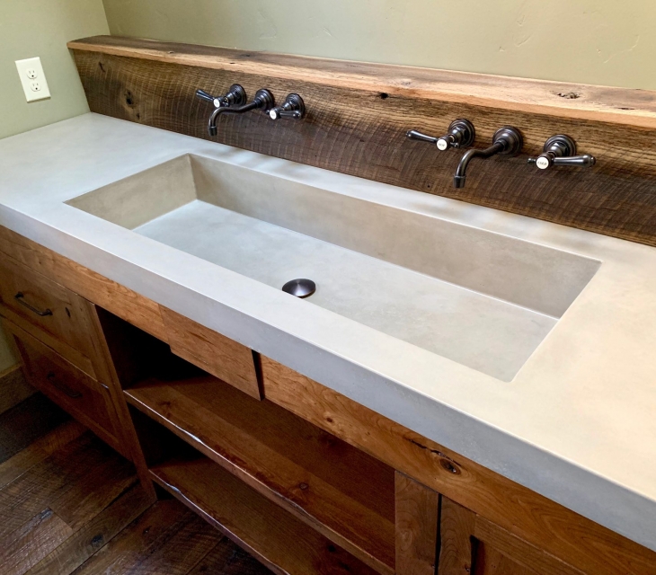 Boulder rustic master bathroom concrete sink