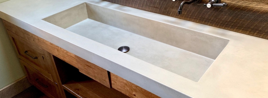 Boulder rustic master bathroom concrete sink