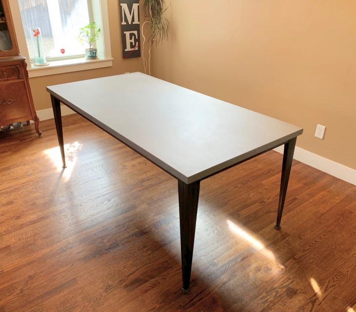 Concrete and steel dining table