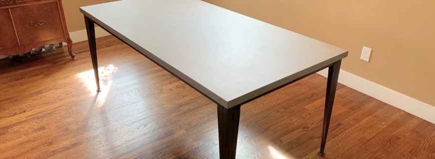 Concrete and steel dining table