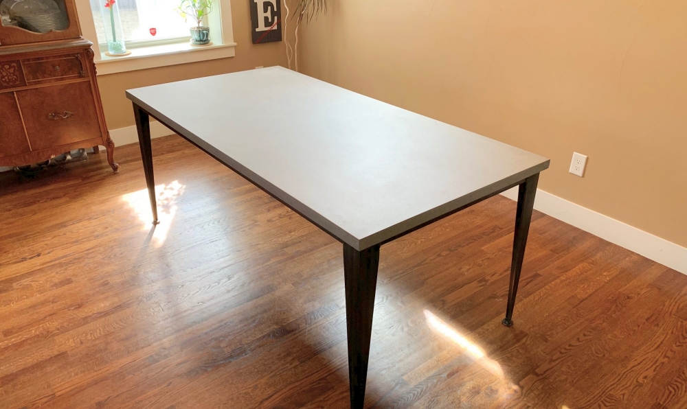 concrete and steel dining table