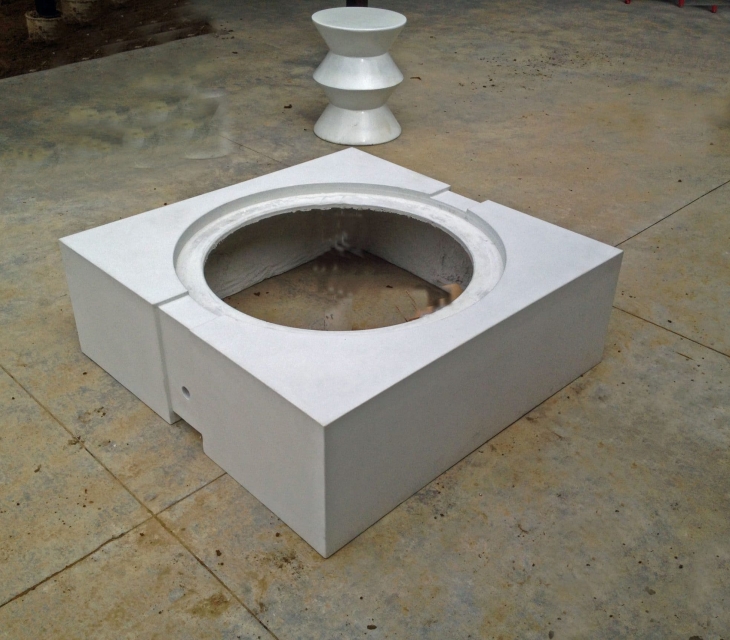 White concrete firepit with reveal