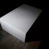 white table in shadow