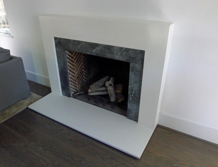 white concrete fireplace