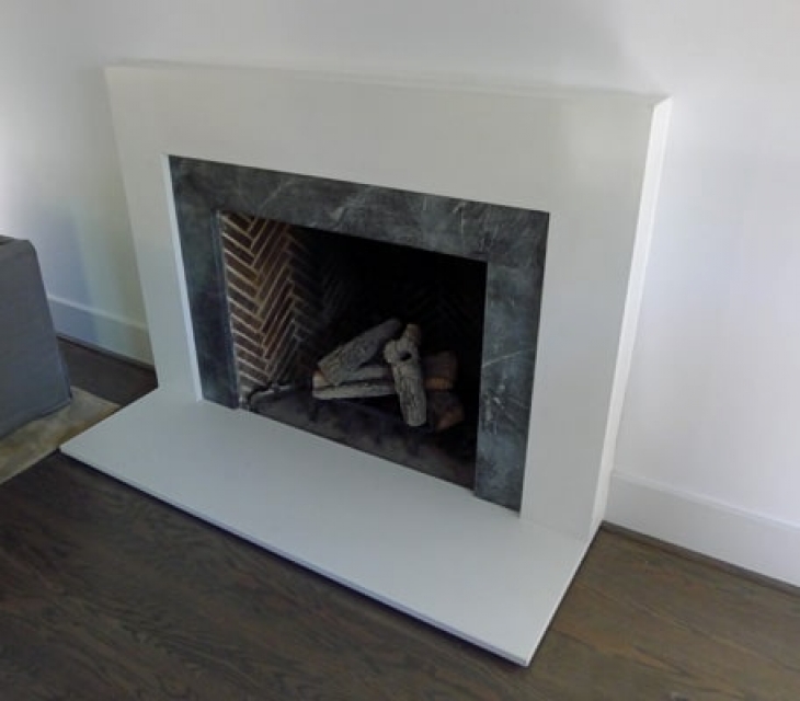 white concrete fireplace