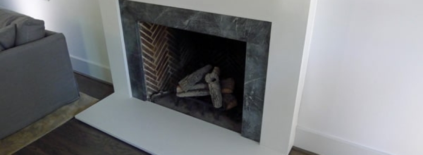 white concrete fireplace